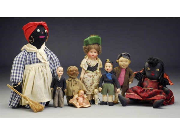 LOT OF 9: ASSORTED DOLLS.                         