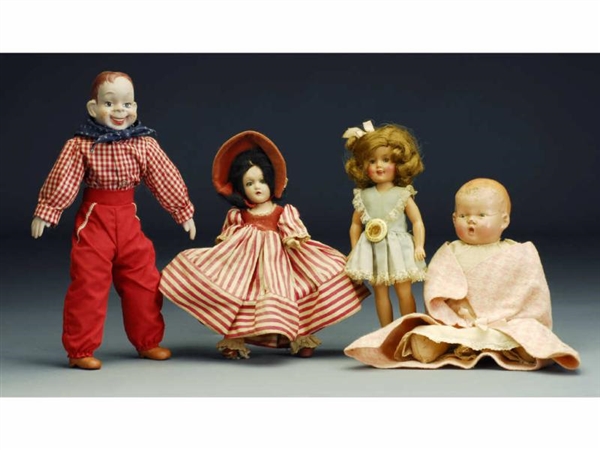 LOT OF 4: ASSORTED DOLLS.                         