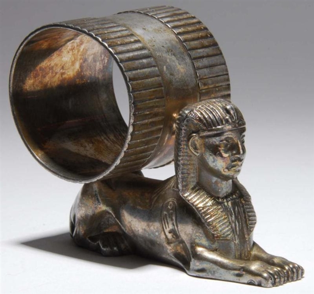EGYPTIAN SPHINX FIGURAL NAPKIN RING.              