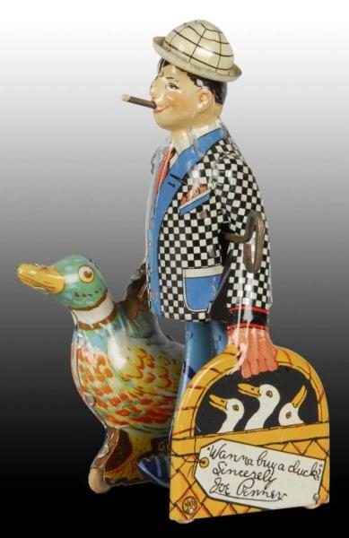 MARX TIN WIND-UP JOE PENNER & HIS DUCK TOY.       