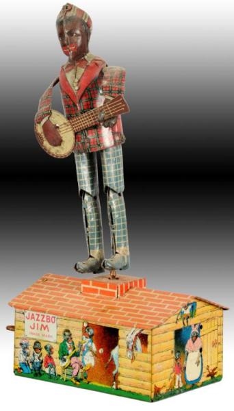 STRAUSS TIN WIND-UP JAZZBO JIM ROOF DANCING TOY.  