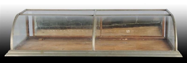 COUNTRY STORE CURVED GLASS DISPLAY CASE.          