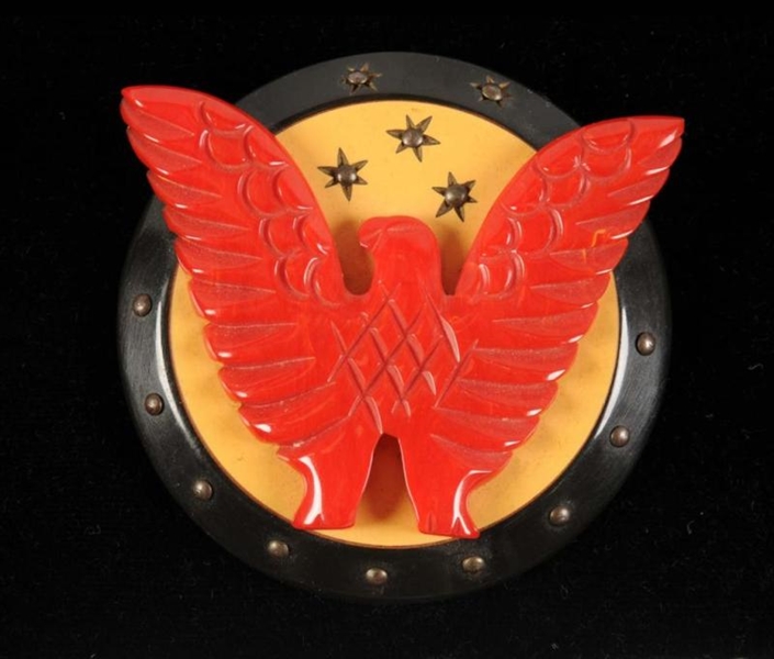 BAKELITE RED, WHITE & BLUE SHIELD PIN WITH EAGLE. 