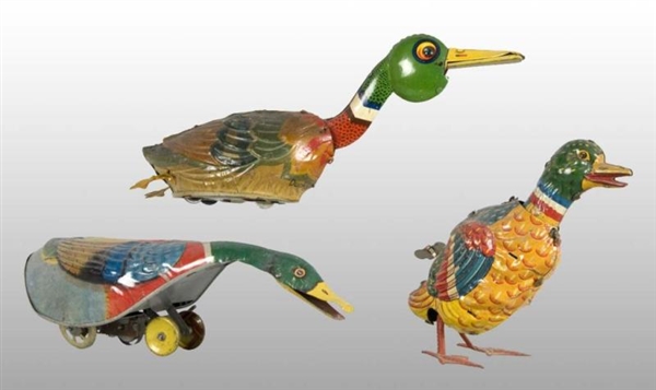 LOT OF 3: TIN LITHO DUCK WIND-UP TOYS.            