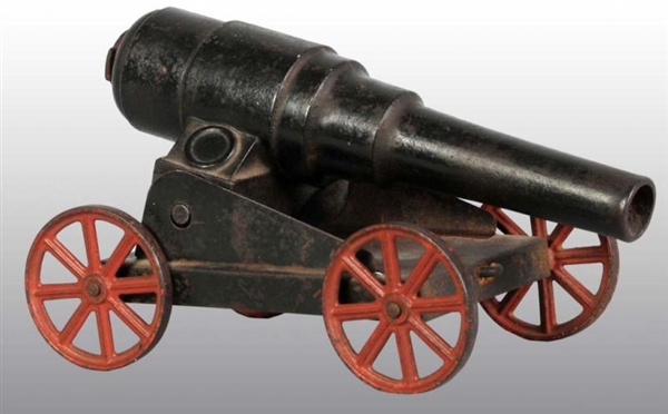 CAST IRON CONVERSE CANNON TOY ON WHEELS.          