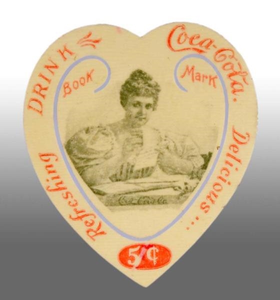 CELLULOID COCA-COLA HEART-SHAPED BOOKMARKER.      