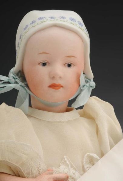GEBR. HEUBACH CHARACTER BABY 7977 WITH MOLDED HAT.