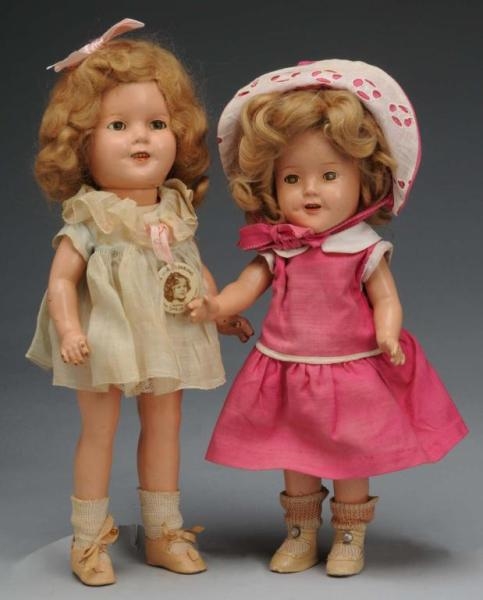 LOT OF 2: COMPOSITION SHIRLEY TEMPLE DOLLS.       