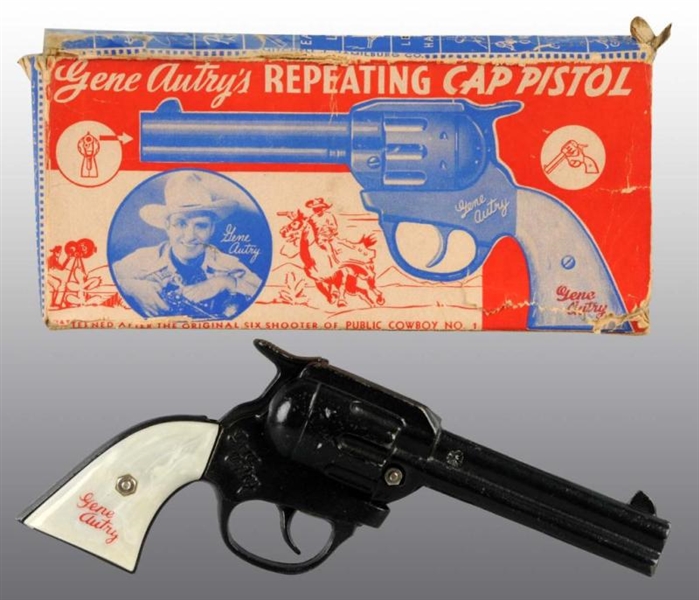 CAST IRON GENE AUTRY REPEATING TOY CAP GUN.       