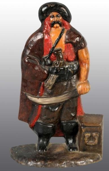 CAST IRON PIRATE BY TREASURE CHEST DOORSTOP.      