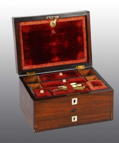 WOODEN SEWING BOX WITH MOTHER OF PEARL INLAY.     