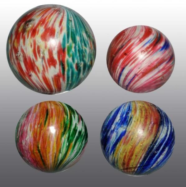 LOT OF 4: LARGE ONIONSKIN MARBLES.                