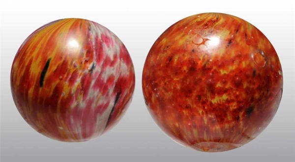 LOT OF 2: LARGE ONIONSKIN MARBLES.                