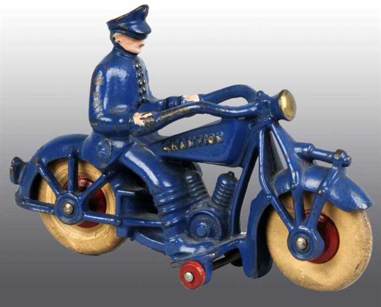 CAST IRON CHAMPION MOTORCYCLE TOY.                