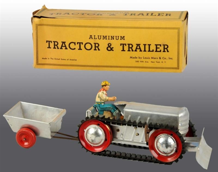 MARX TIN WIND-UP TRACTOR AND TRAILOR TOY SET.     