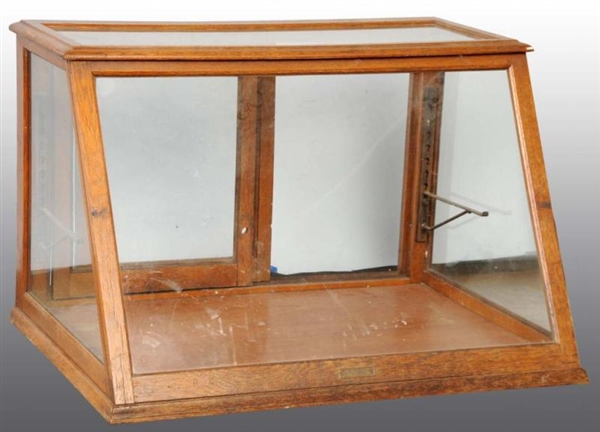 COUNTRY STORE SLANT FRONT GLASS DISPLAY CASE.     