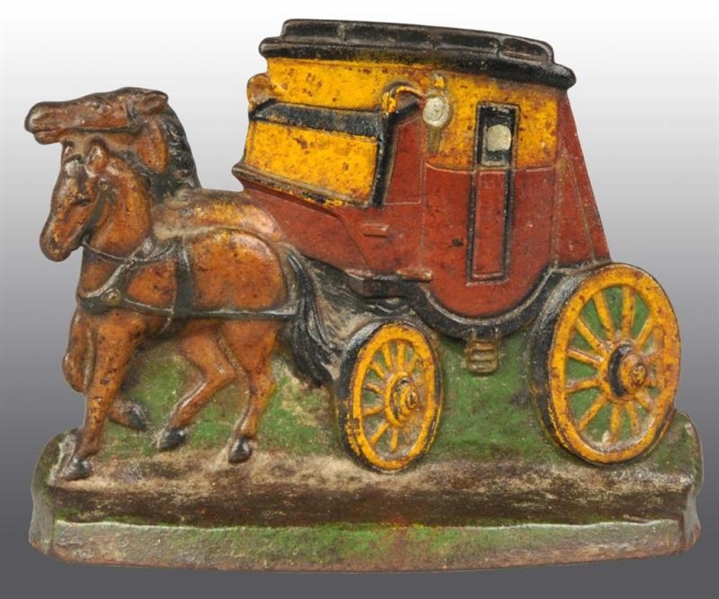 CAST IRON HORSES WITH STAGECOACH DOORSTOP.        