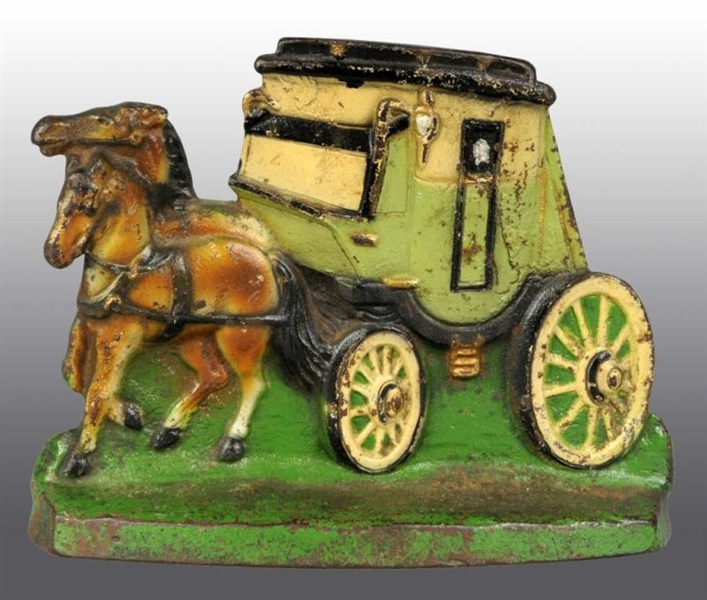 CAST IRON HORSES WITH STAGECOACH DOORSTOP.        