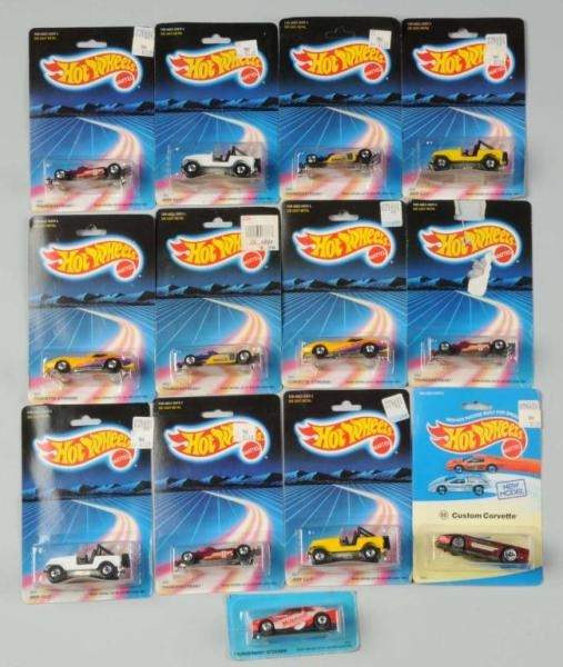 LOT OF 13: HOT WHEELS FOREIGN-PACKAGED VEHICLES.  