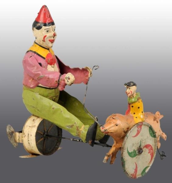 TIN HAND-PAINTED CLOWNS & PIG WIND-UP TOY         