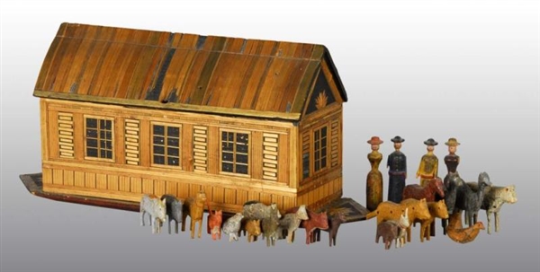WOODEN STRAW-COVERED NOAHS ARK TOY.              