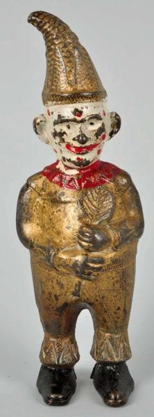 CAST IRON CLOWN WITH CROOKED HAT STILL BANK.      