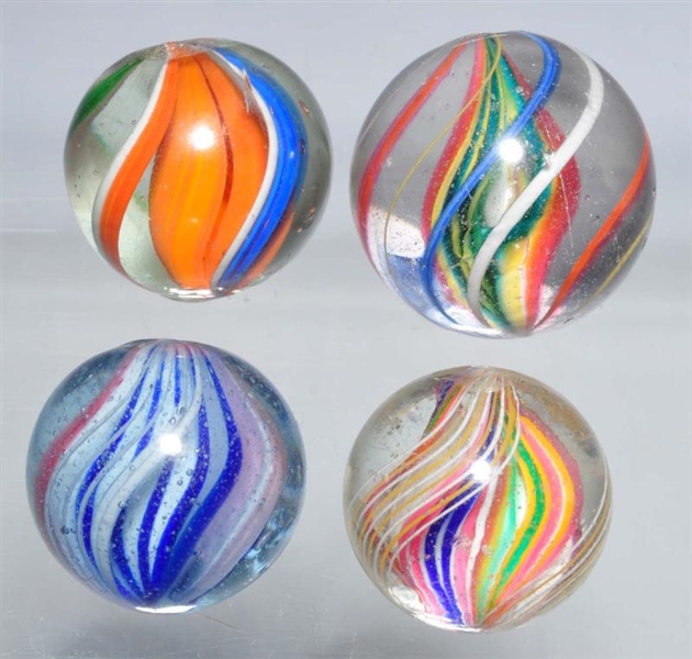 LOT OF 4: SWIRL MARBLES.                          