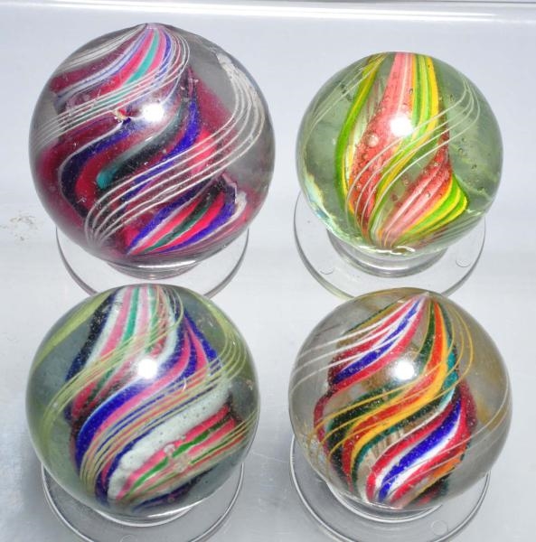 LOT OF 4: LARGE DIVIDED CORE SWIRL MARBLES.       