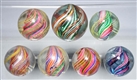 LOT OF 7: MULTI-COLOR SWIRL MARBLES.              