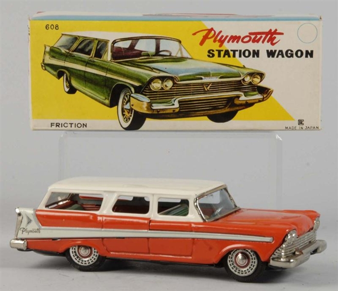 TIN LITHO PLYMOUTH STATION WAGON FRICTION TOY.    