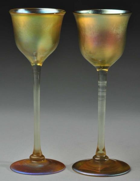 PAIR OF SIGNED TIFFANY STEMMED CORDIALS.          