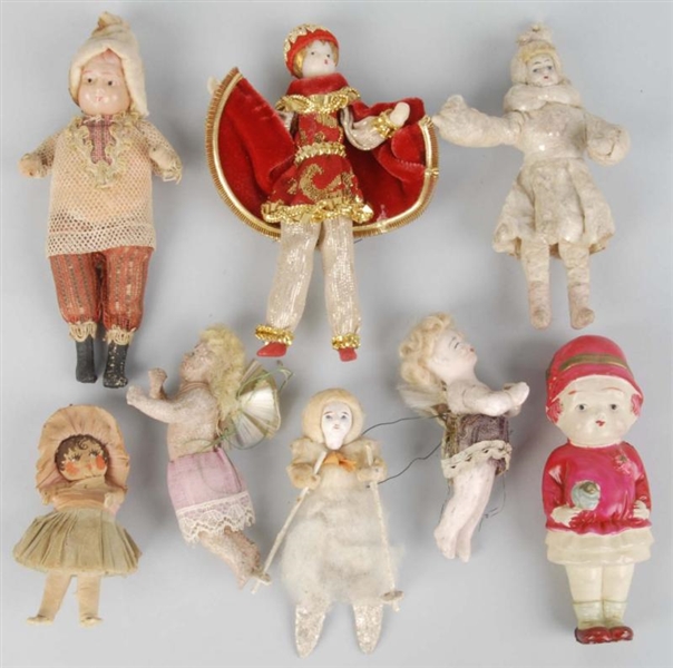 LOT OF 8: FIGURAL CHILD CHRISTMAS ORNAMENTS.      