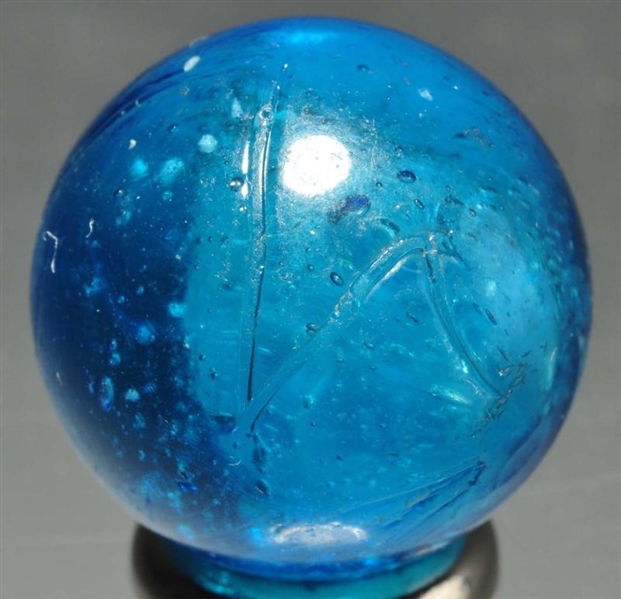 SINGLE PONTIL CLOUD MARBLE IN BLUE GLASS.         