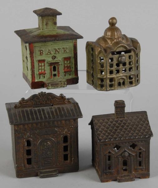 LOT OF 4: CAST IRON BUILDING BANKS.               