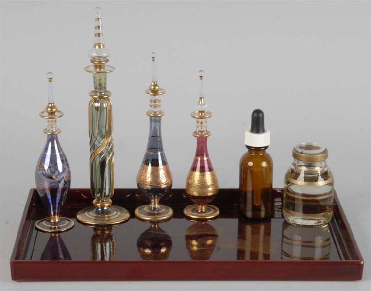 COLLECTION OF HAND BLOWN PERFUME BOTTLES.         