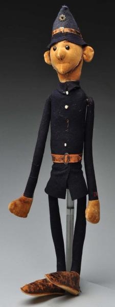 EARLY CARICATURE POLICEMAN DOLL.                  
