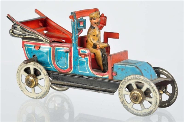 TIN LITHO TAXI PENNY TOY.                         