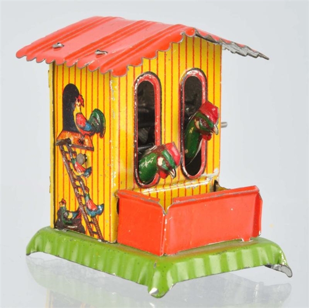 TIN LITHO CHICKEN COOP PENNY TOY.                 