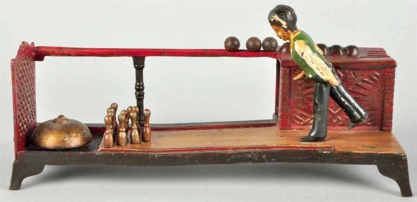 CAST IRON BOWLING ALLEY MECHANICAL BANK.          