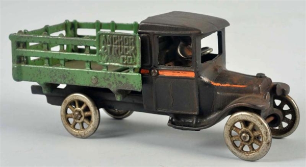CAST IRON ARCADE STAKE-BACK TRUCK TOY.            