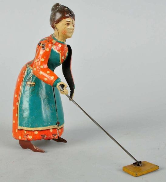 TIN LITHO BUSY LIZZIE WIND-UP TOY.                