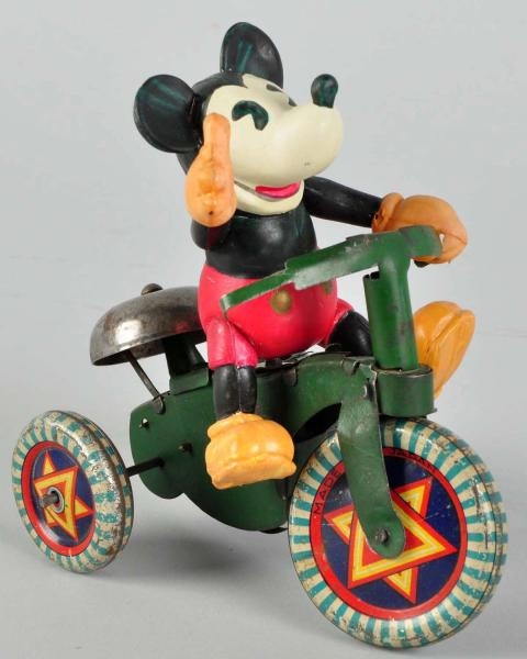 CELLULOID & TIN DISNEY MICKEY MOUSE CYCLE TOY.    