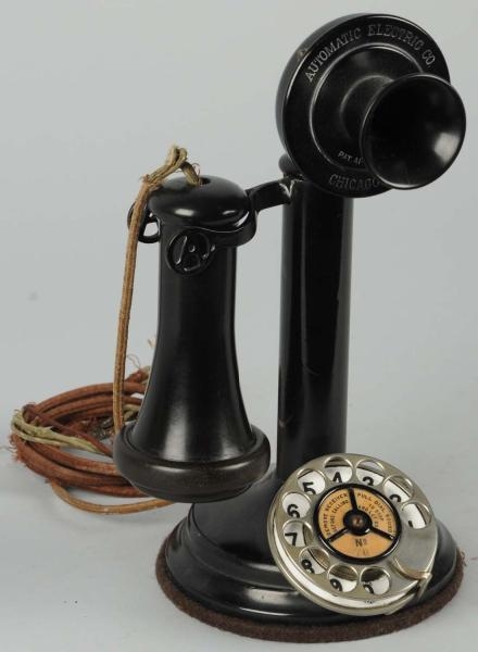 AUTOMATIC ELECTRIC STEP TELEPHONE WITH A IN HOOK. 