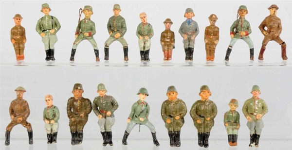 LOT OF 19: COMPOSITION SEATED TOY SOLDIERS.       