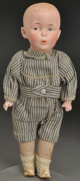 CUTE GERMAN BISQUE CHARACTER DOLL.                