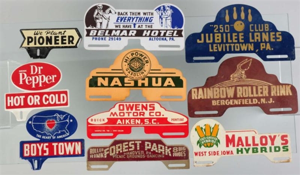 LOT OF 10: ASSORTED LICENSE PLATE TOPPERS.        