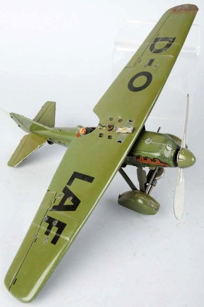 TIN LITHO TIPPCO AIRPLANE WIND-UP TOY.            