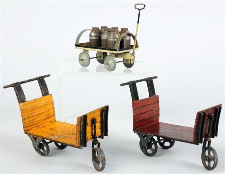 LOT OF 3: HAND-PAINTED TIN BAGGAGE CARTS.         
