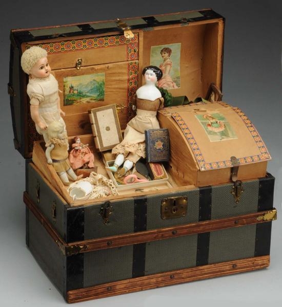 ANTIQUE DOLL TRUNK AND CONTENTS.                  
