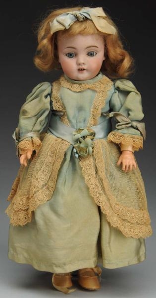 GERMAN BISQUE CHARACTER CHILD DOLL.               